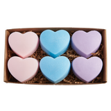 self care soaps shaped like hearts, pink heart soap, blue heart soap, purple heart soap.